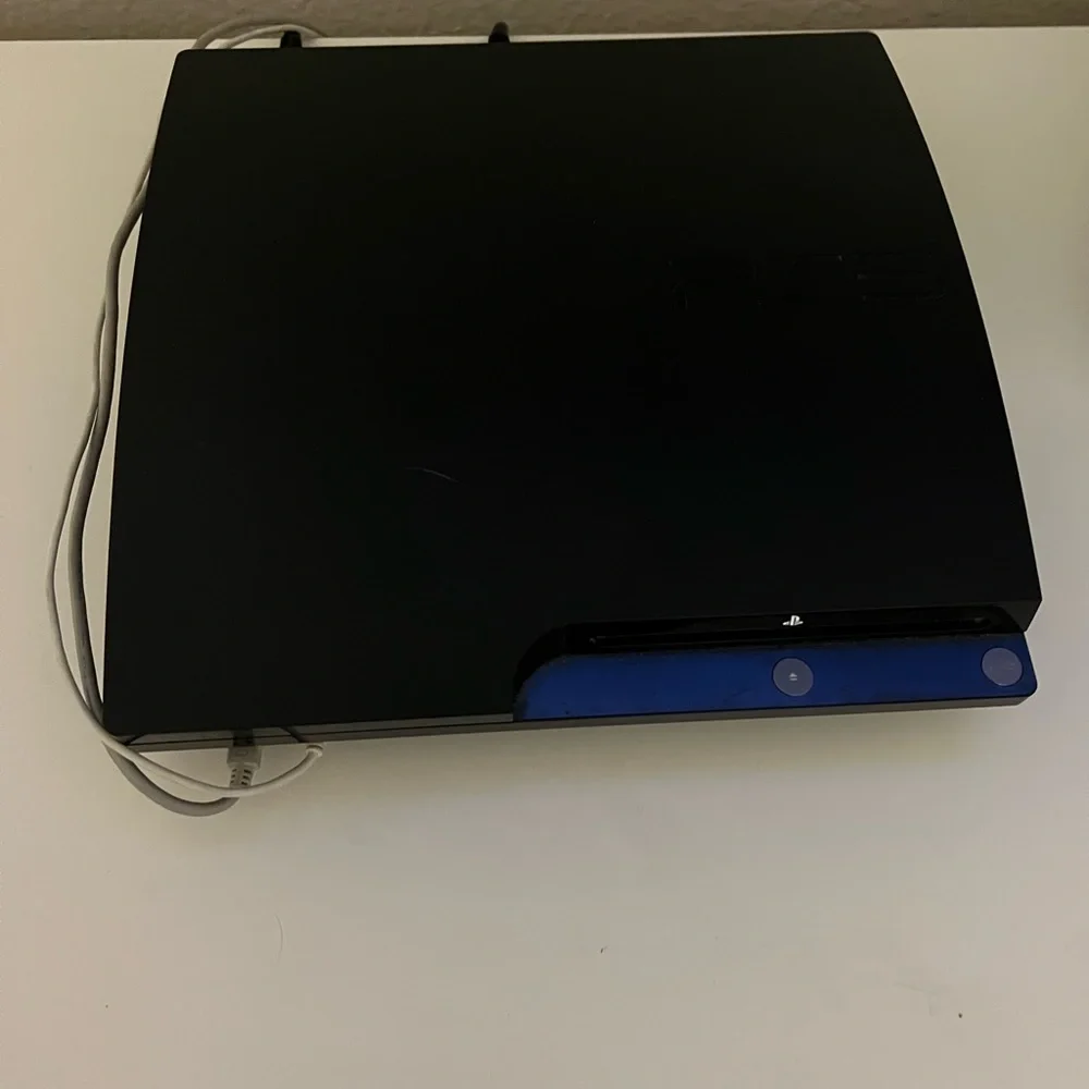 PS3 black comes with everything including over 15 games